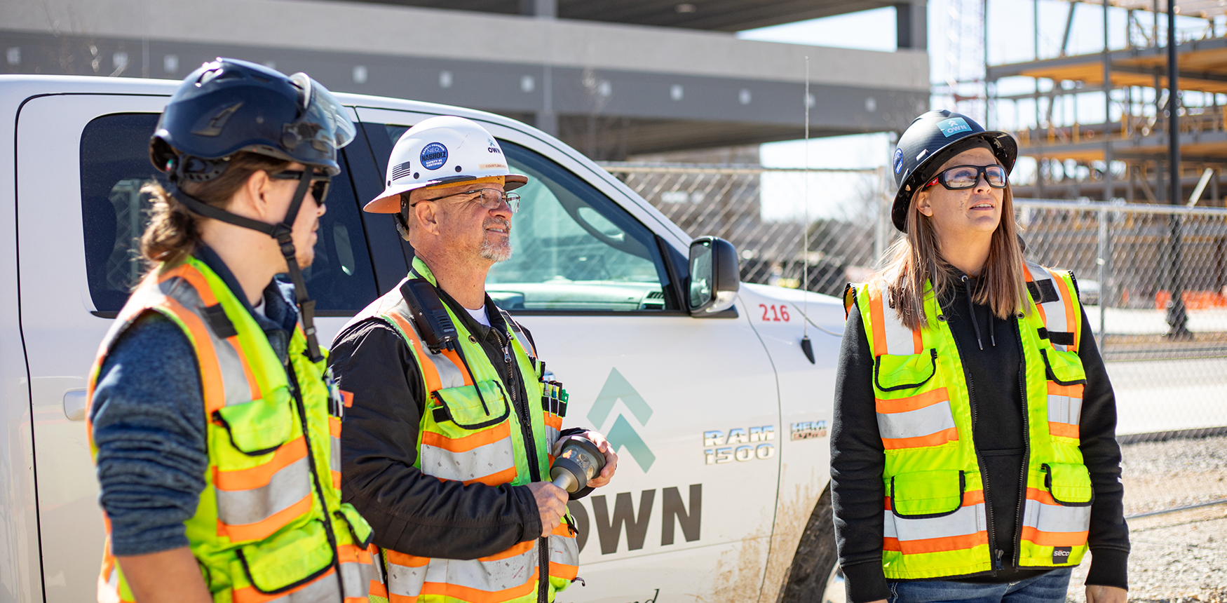 OWN employees working on job site.